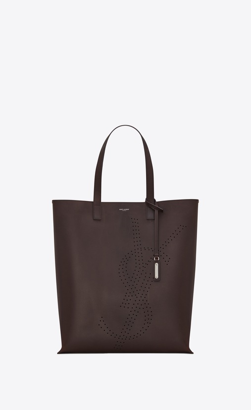 bold shopping bag in vintage leather with perforated logo